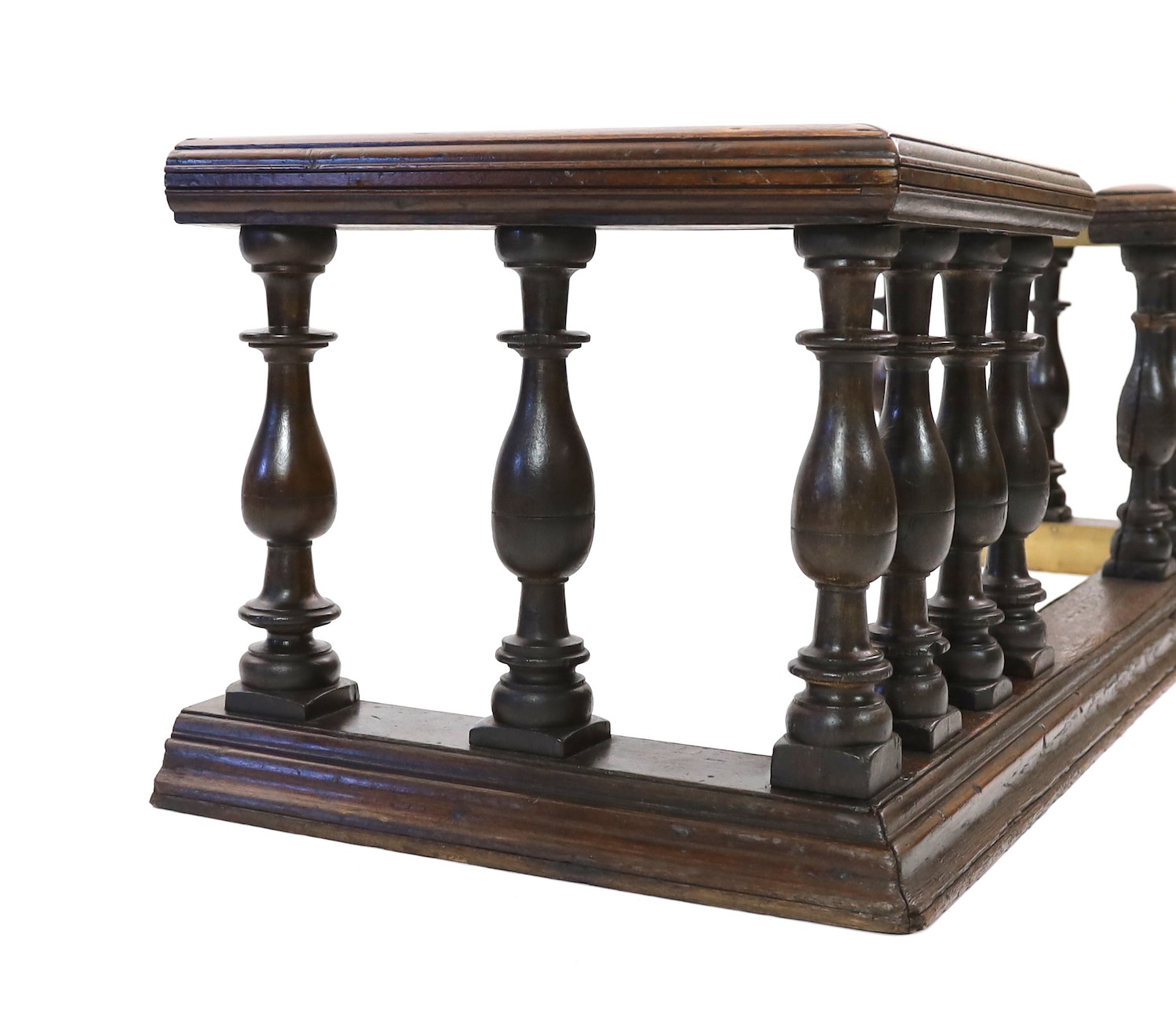 A 19th century brass mounted oak club fender, width 182cm depth 69cm height 58cm
